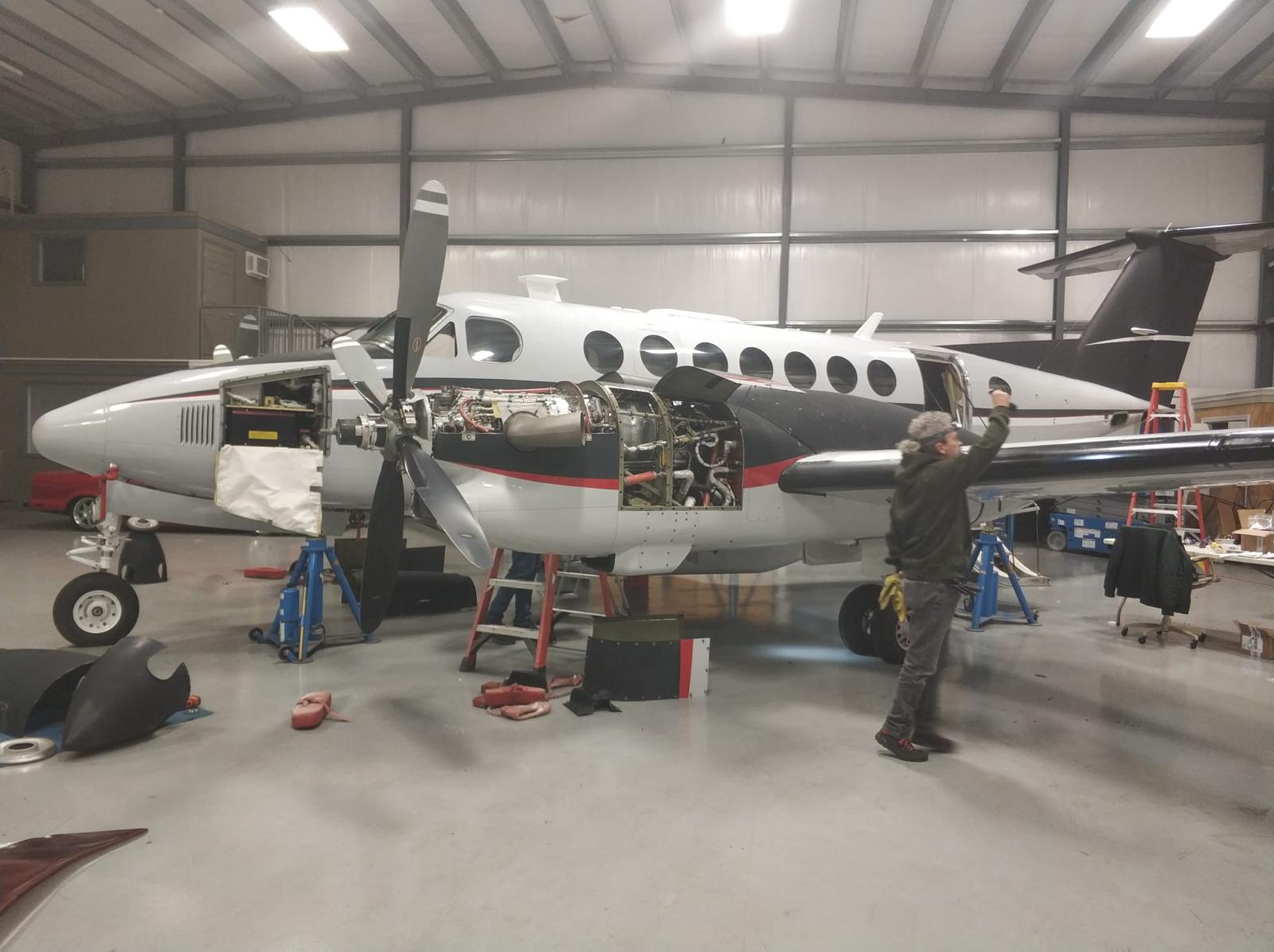 King Air with cowlings open for a pre-purchase inspection