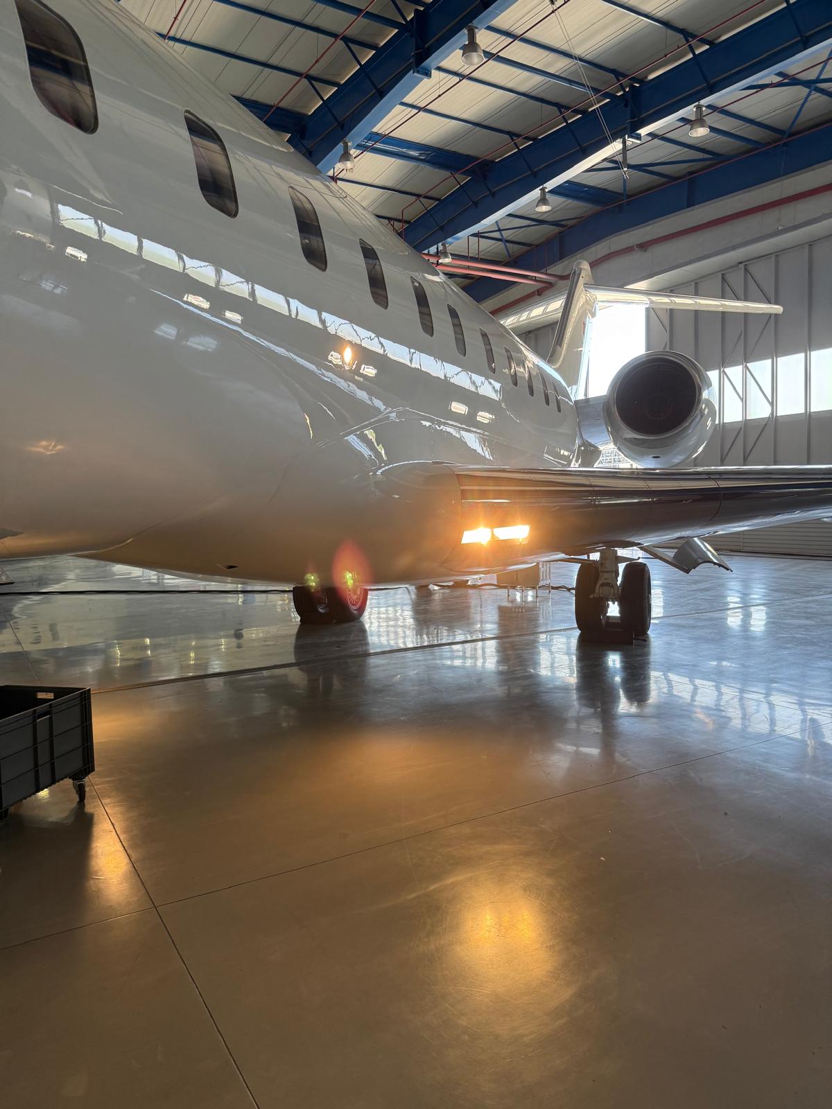Business jet in the hangar for inspection