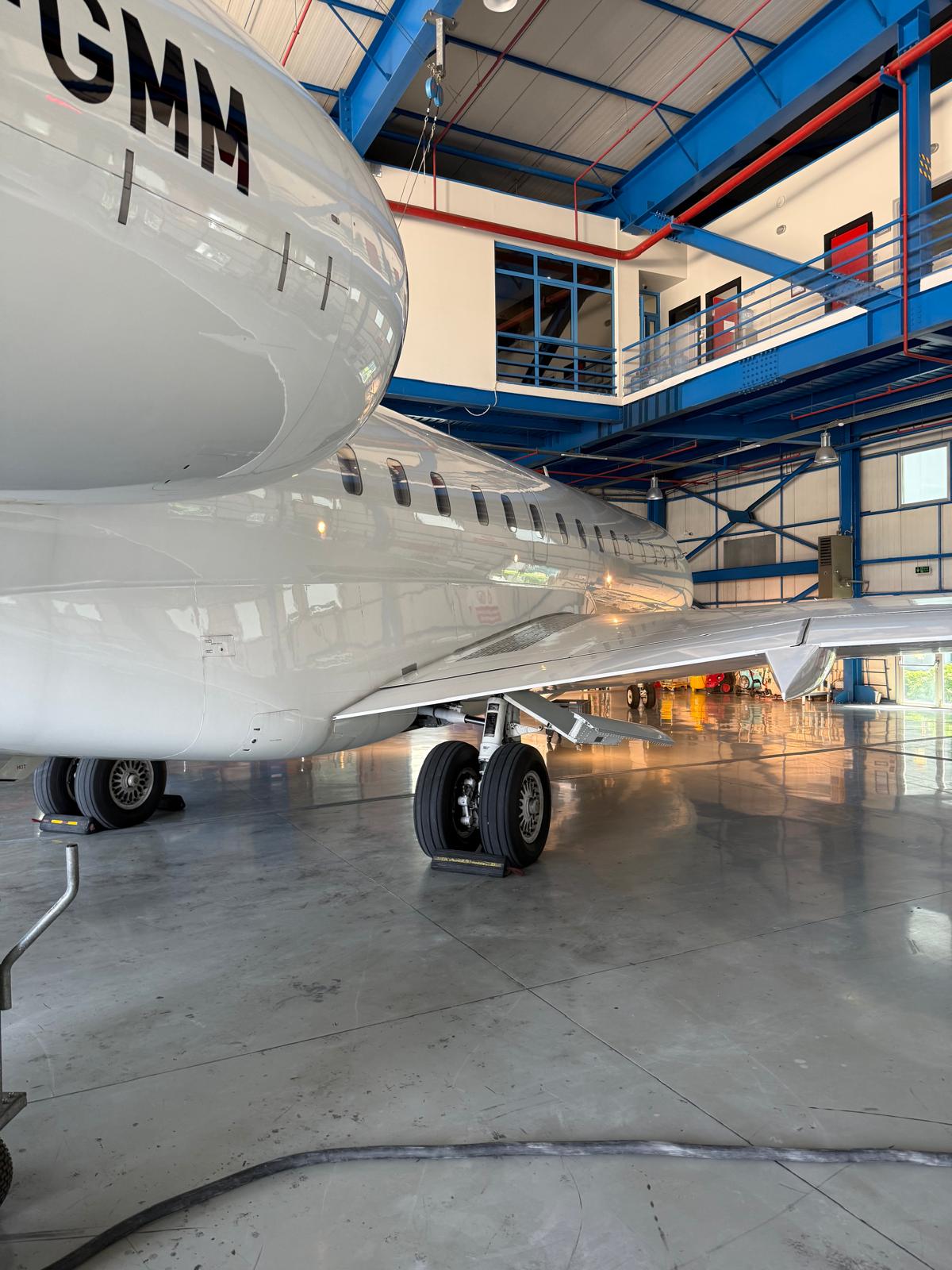 Business jet in the hangar for inspection