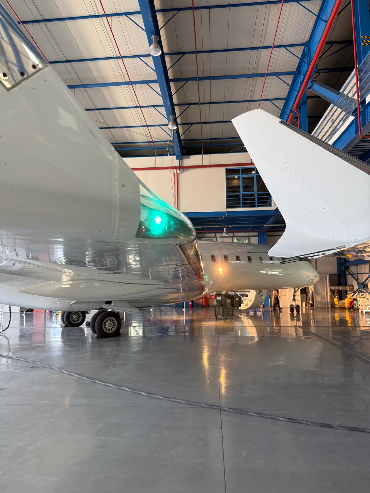 Business jet in the hangar for inspection
